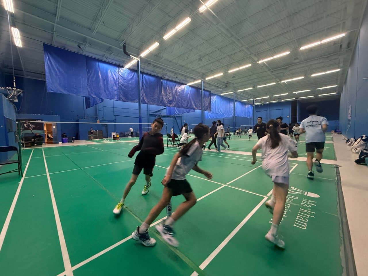 Competitive badminton training at Markham Badminton Club